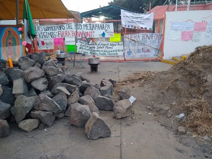 Acusan a Danone por sequía y despojo en Puebla