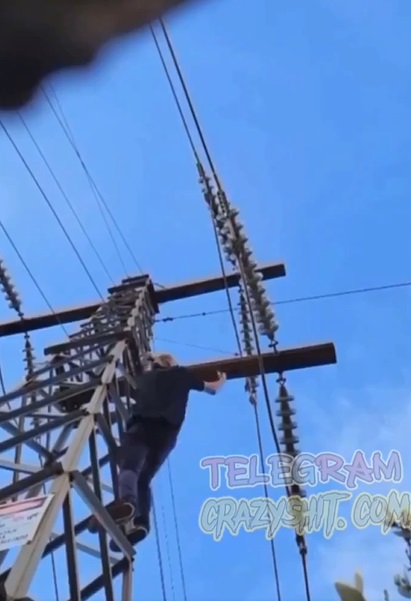Joven toca cable de alta tensión